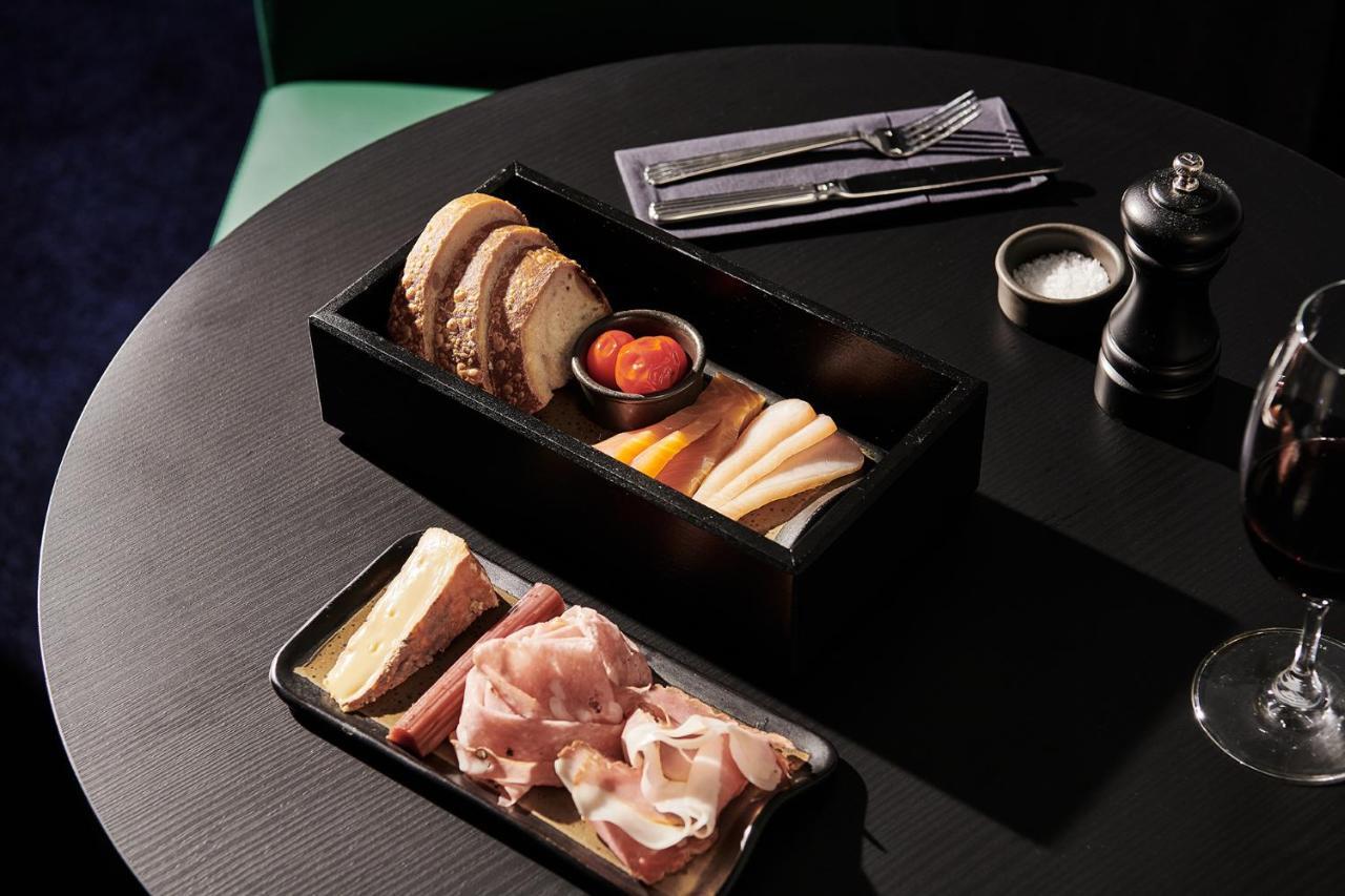 Midnight Hotel, Autograph Collection Camberra Exterior foto A selection of cured meats and cheeses